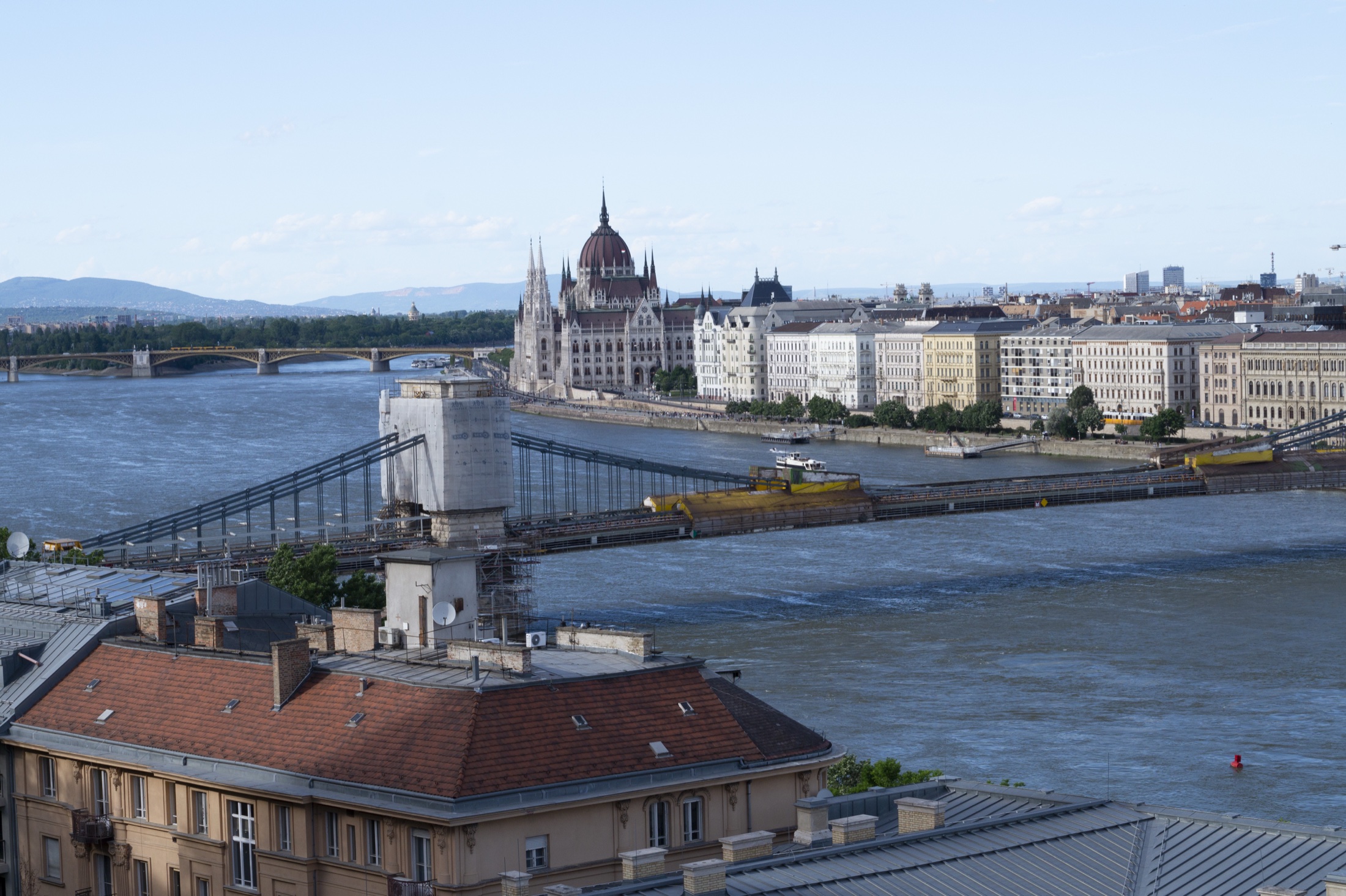 Chain Bridge in the foreground with the Hungarian Parliament across the Danube, viewed from Buda